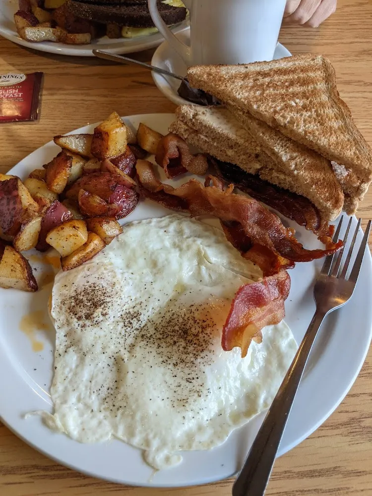 Refs over Easy Toast Bacon and Home Fries